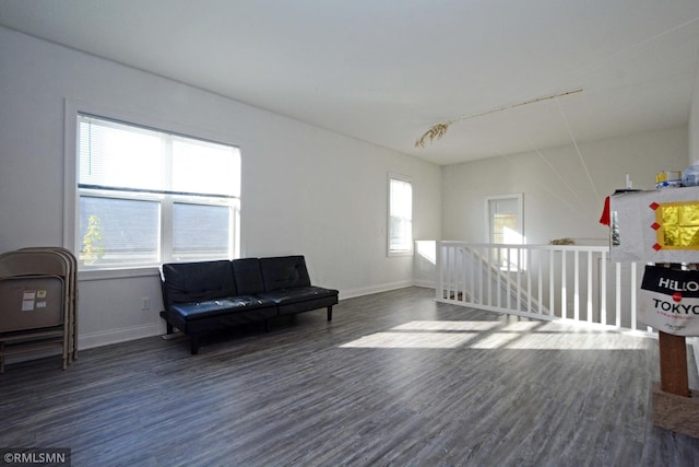 living area featuring dark wood-type flooring