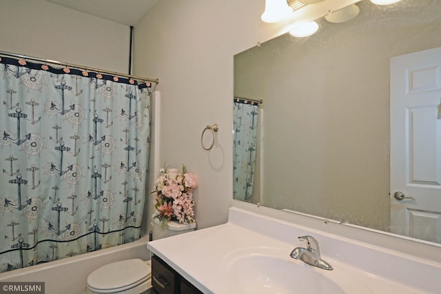 full bathroom with vanity, toilet, and shower / tub combo