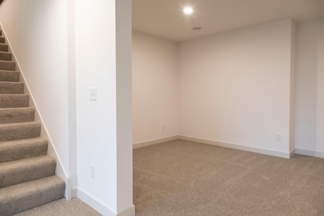 basement featuring carpet floors