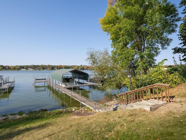 dock area featuring a water view