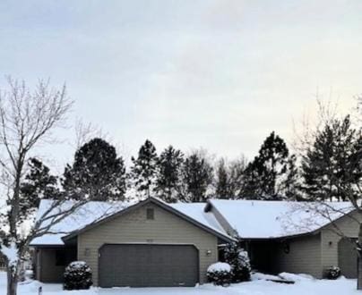 single story home featuring a garage