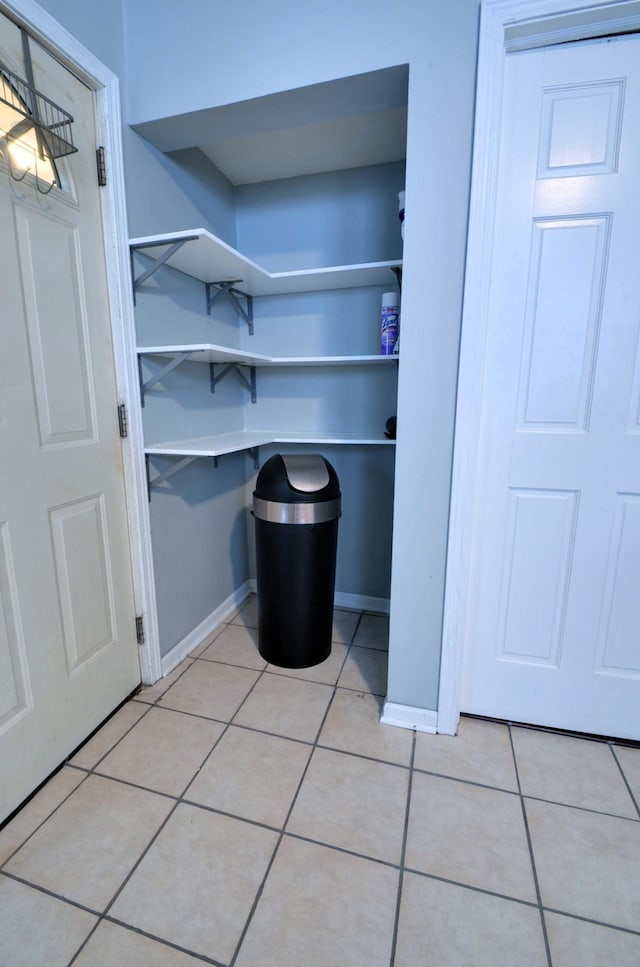 interior space featuring tile patterned flooring