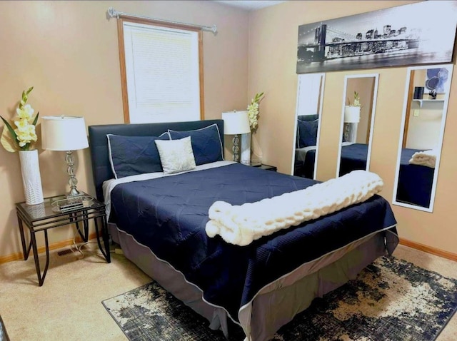 bedroom featuring carpet