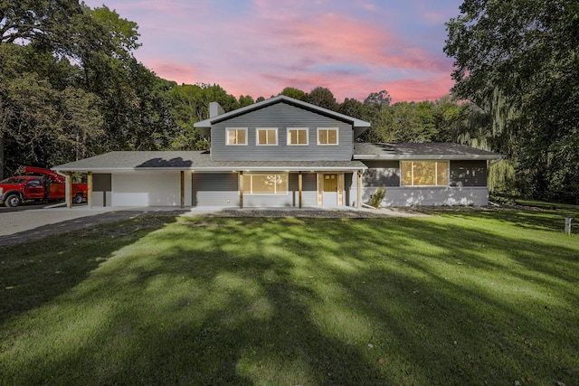 view of front of home featuring a yard and a porch