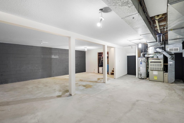 basement with heating unit and water heater