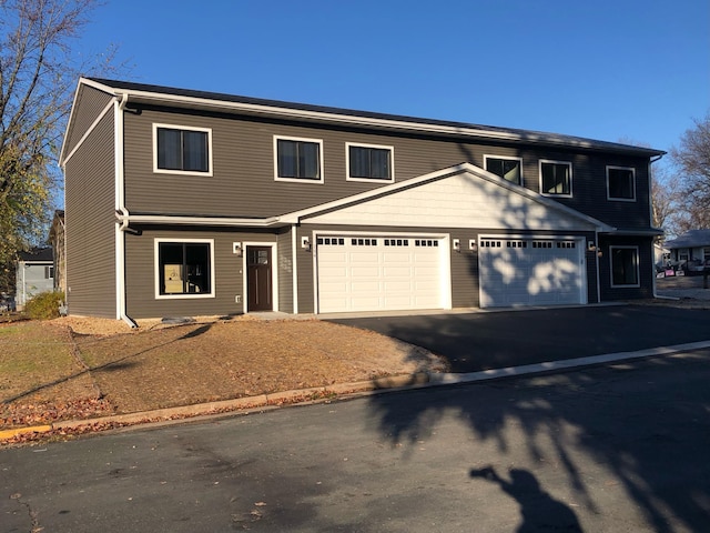 front of property featuring a garage