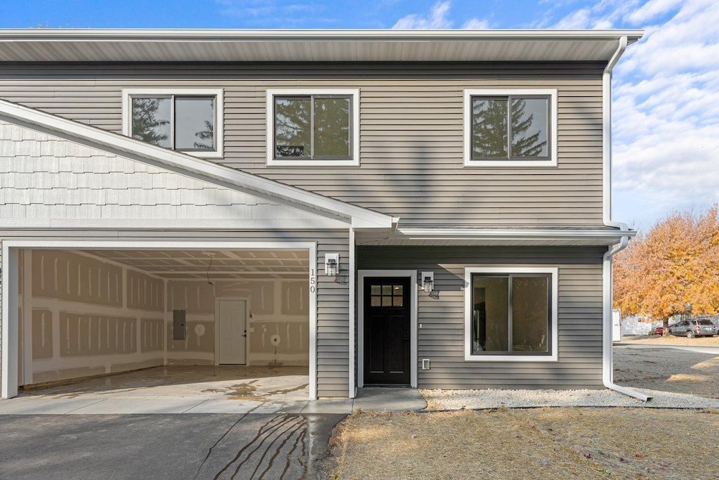 view of front of home with a garage