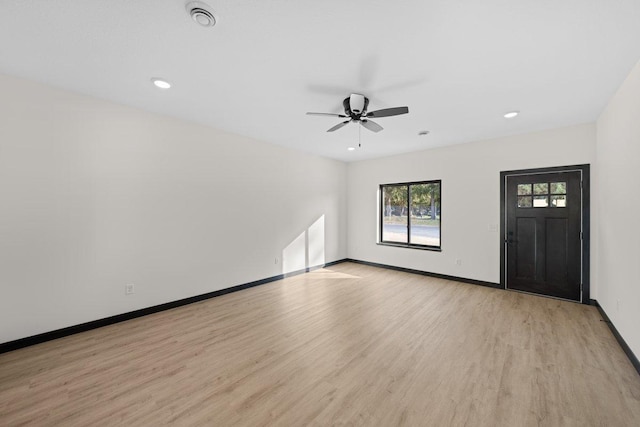 interior space with light hardwood / wood-style floors and ceiling fan