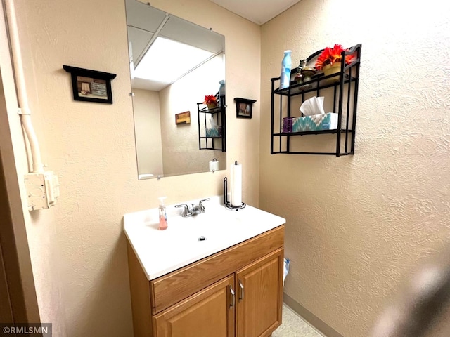 103 Pearl St, Adrian, MN 56110 - bathroom with vanity and a textured wall