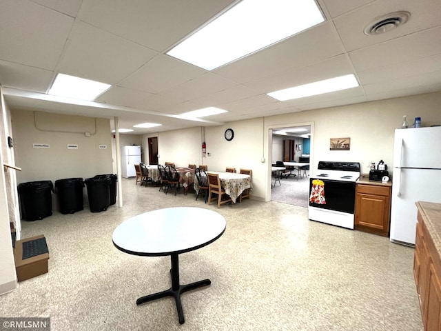 misc room featuring a paneled ceiling