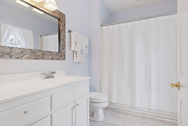 full bathroom featuring vanity, shower / bath combo, and toilet