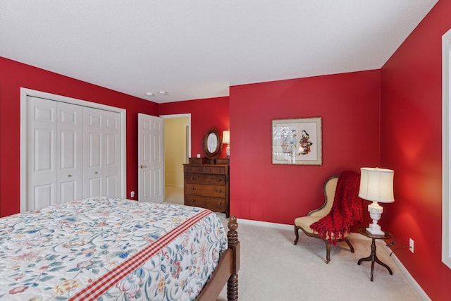 bedroom with carpet floors and a closet