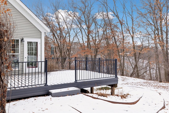 view of snow covered deck