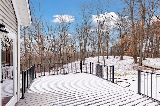 view of snow covered deck