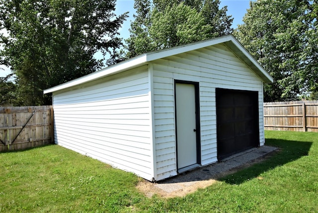 313 10th Ave NE, Roseau, MN 56751 - view of outbuilding with a fenced backyard and an outdoor structure