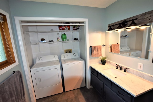 313 10th Ave NE, Roseau, MN 56751 - washroom with a sink and independent washer and dryer