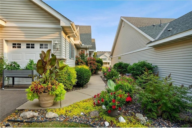 view of yard featuring a garage