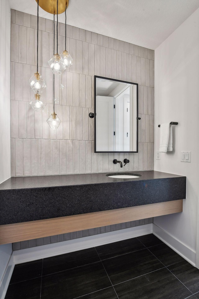 bathroom with vanity, tile patterned floors, and tile walls