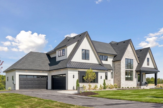 modern inspired farmhouse featuring a front lawn