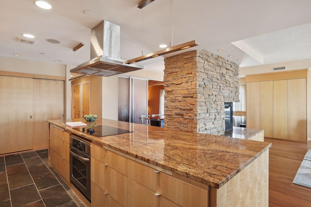 kitchen with black electric cooktop, a center island, dark hardwood / wood-style floors, oven, and island exhaust hood