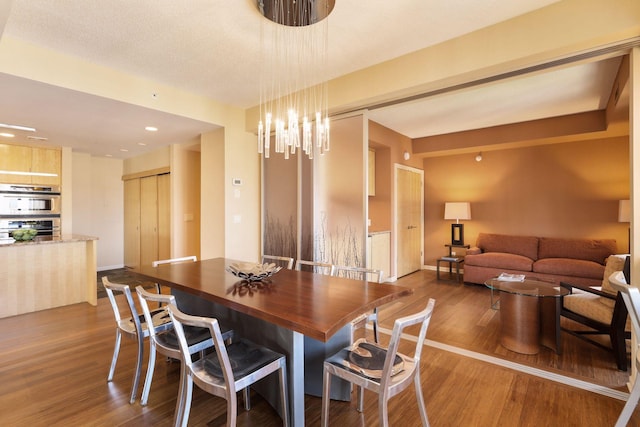 dining area with dark hardwood / wood-style flooring