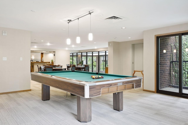 recreation room with light colored carpet and pool table