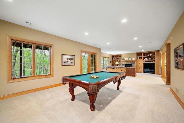 rec room featuring light colored carpet, billiards, and built in features