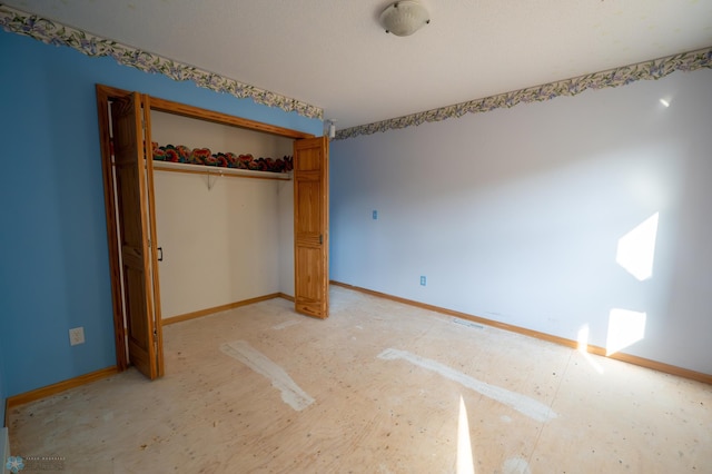 unfurnished bedroom featuring a closet