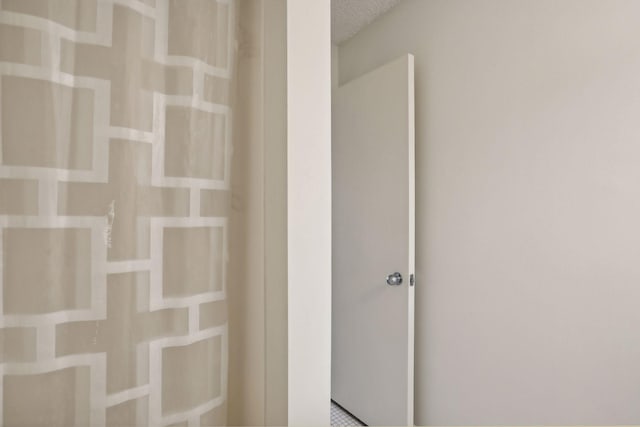 bathroom with a textured ceiling