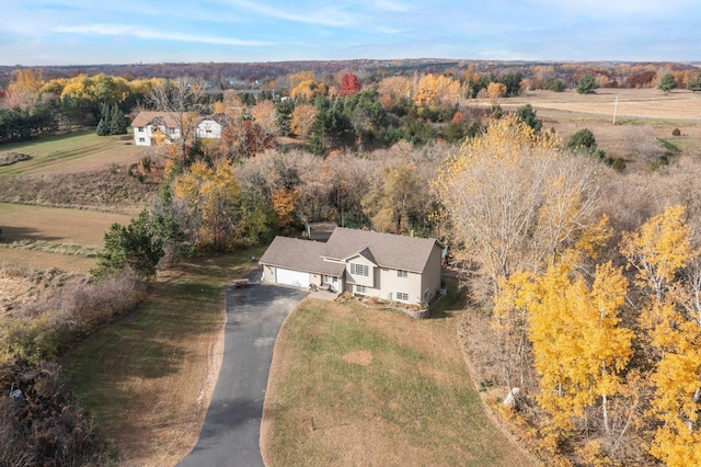 birds eye view of property featuring a rural view