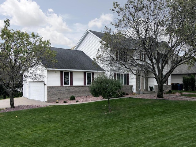 view of front of property featuring a garage, concrete driveway, roof with shingles, a front yard, and brick siding