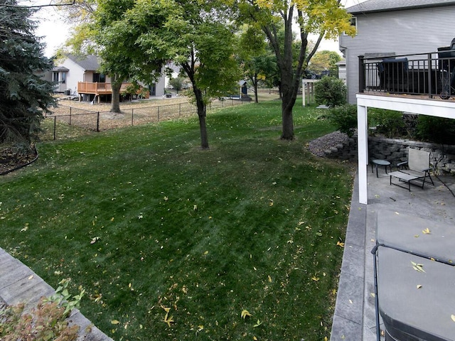 view of yard featuring a patio area and fence