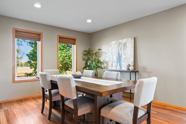 dining area with light wood-type flooring