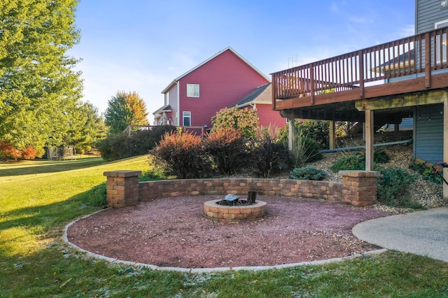 view of yard featuring a wooden deck