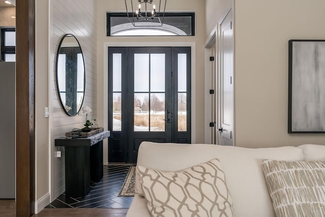 bedroom featuring dark hardwood / wood-style flooring and a notable chandelier