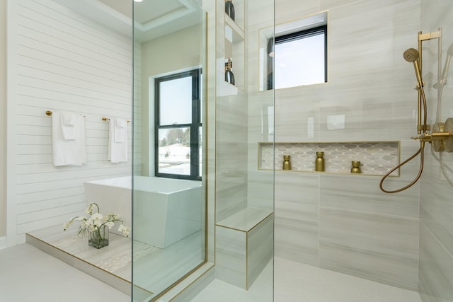 bathroom featuring a tile shower