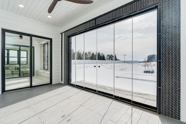 interior space featuring ceiling fan