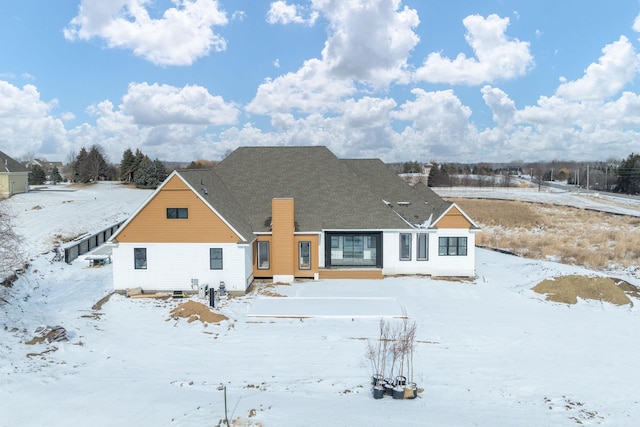 view of snow covered property