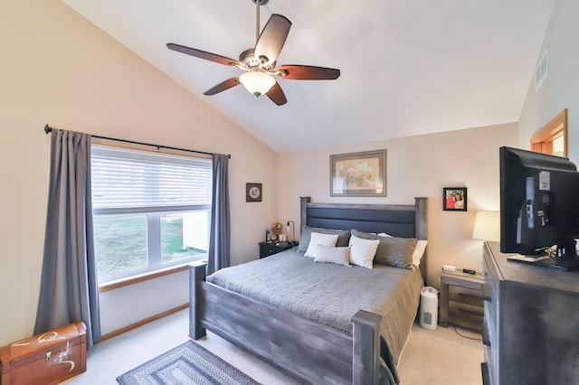 carpeted bedroom featuring vaulted ceiling and ceiling fan