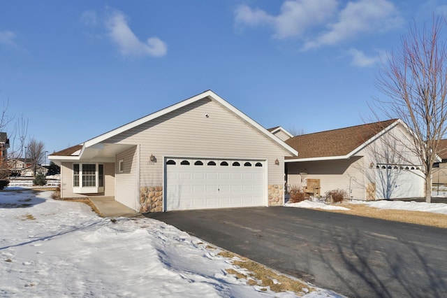 ranch-style home with a garage