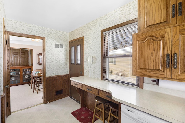 4312 Georgia Ave N, Crystal, MN 55428 - office space with wallpapered walls, visible vents, a wainscoted wall, and a wealth of natural light