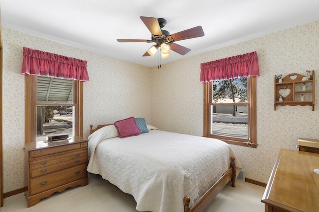 4312 Georgia Ave N, Crystal, MN 55428 - bedroom featuring wallpapered walls, a ceiling fan, baseboards, and light carpet