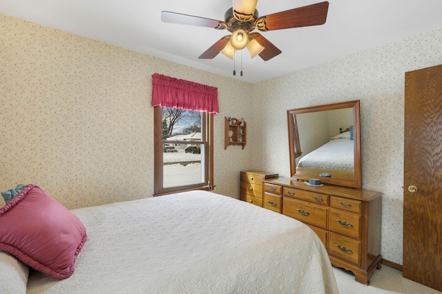4312 Georgia Ave N, Crystal, MN 55428 - bedroom with light carpet, wallpapered walls, and a ceiling fan