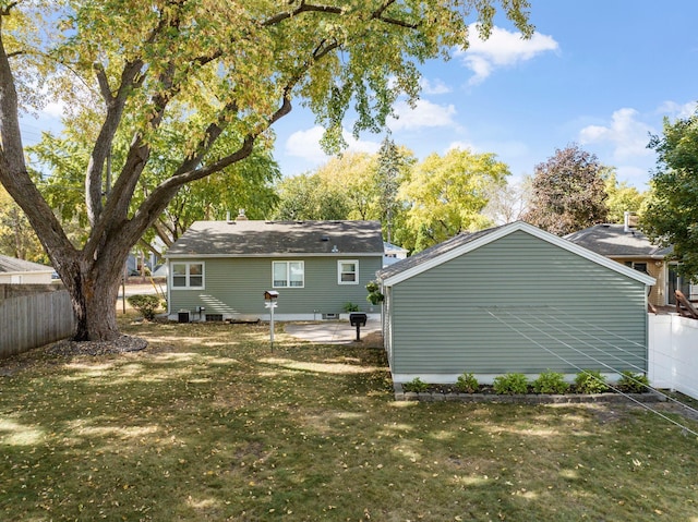 4312 Georgia Ave N, Crystal, MN 55428 - back of house with a yard and fence