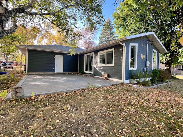 ranch-style house with a patio