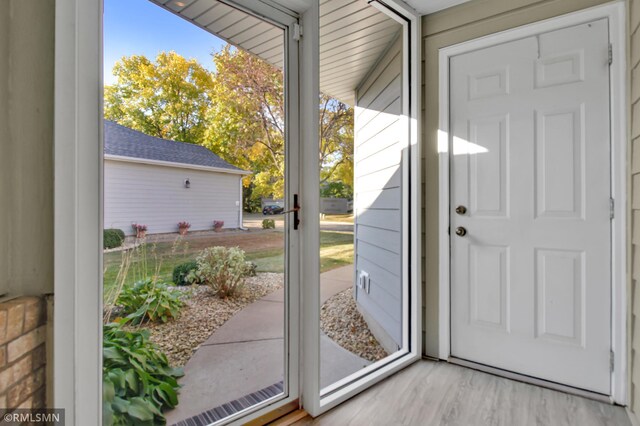 doorway featuring hardwood / wood-style flooring