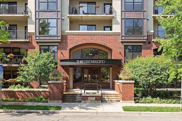 doorway to property with a balcony