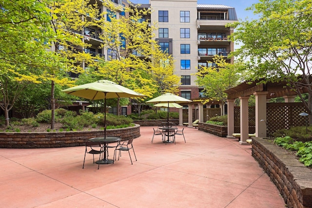 surrounding community featuring a patio