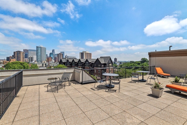 view of patio featuring a balcony