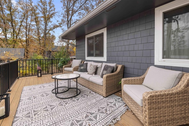 deck with an outdoor hangout area